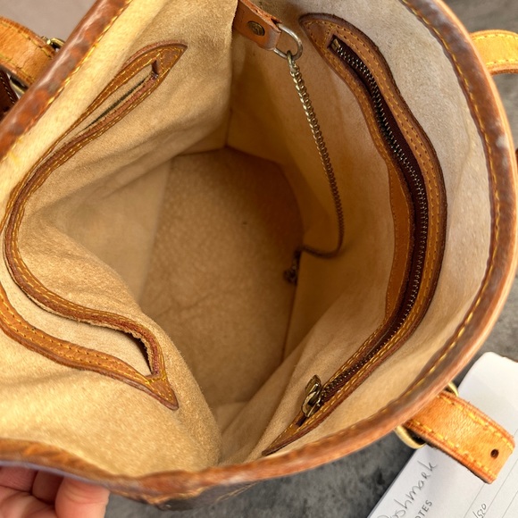 1. LOUIS VUITTON MONOGRAM PETIT BUCKET BAG. - Picture 13 of 14